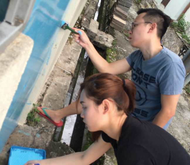 Volunteers helping with practical work